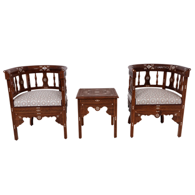 craved Moroccan armchair set with table by Levantiques