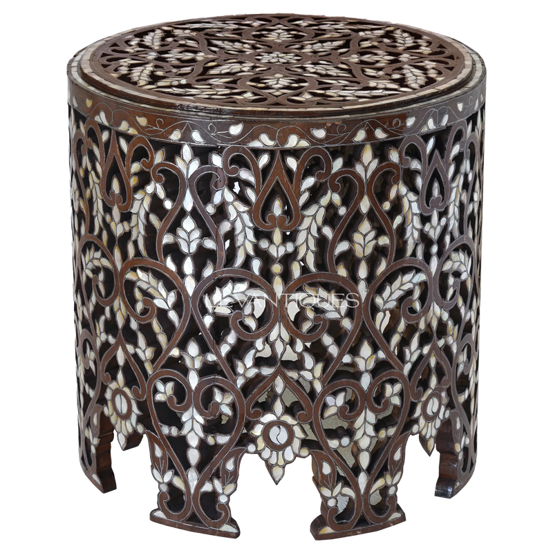 Round coffee table in carved wood and mother of pearl by Levantiques